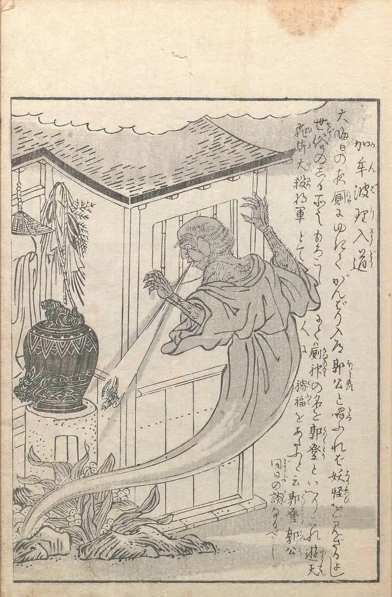 Black-and-white woodblock print: a shaggy, wide-eyed monk-like creature crouches at the window of a wooden outhouse, one clawed hand raised, and blows a straight stream from its mouth with a small cuckoo flying out at the end of it. Everything around it is ordinary household detail: a tiled roof, a robe on a hanger, New Year pine-and-straw decorations, and a large lidded jar on a pedestal. Vertical Japanese text runs down the right side.