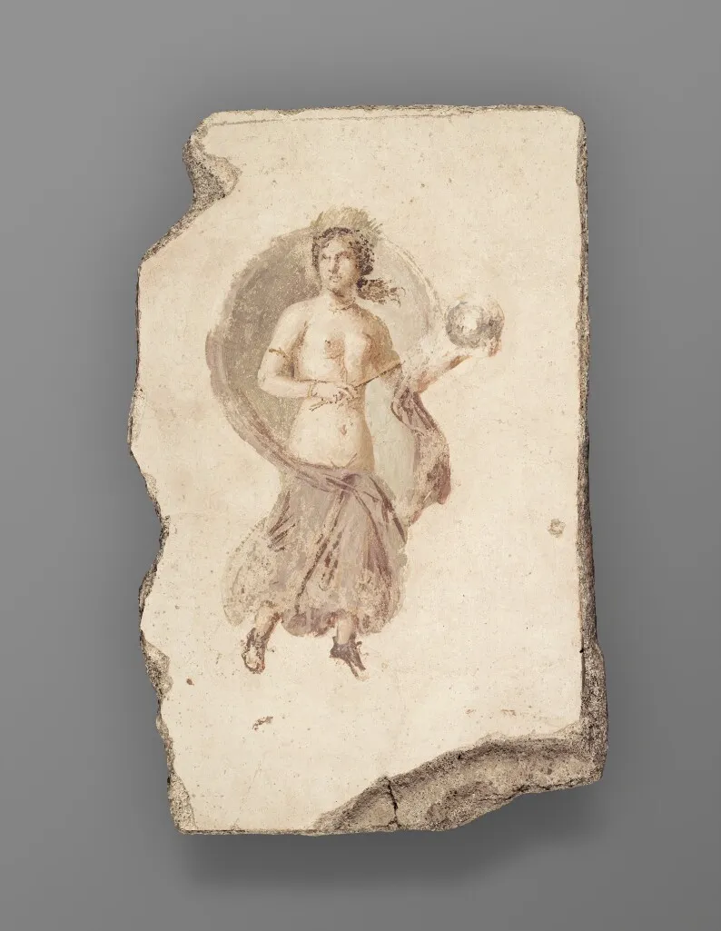 Ancient Roman fresco fragment on stone: a semi-draped female figure floats within a circular halo, holding a wand and a sphere