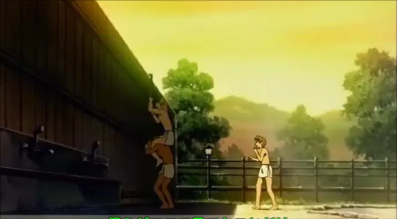 Anime scene at sunset in an outdoor bathing area: two boys climb on each other's shoulders against a tall wooden wall to peek over it with a periscope, while a third boy with a towel around his waist stands nearby, hills and trees behind.