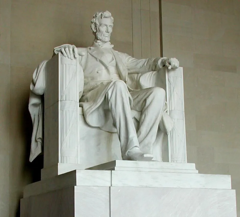 The Lincoln Memorial statue, with two fasces visible at the two sides of the chair.