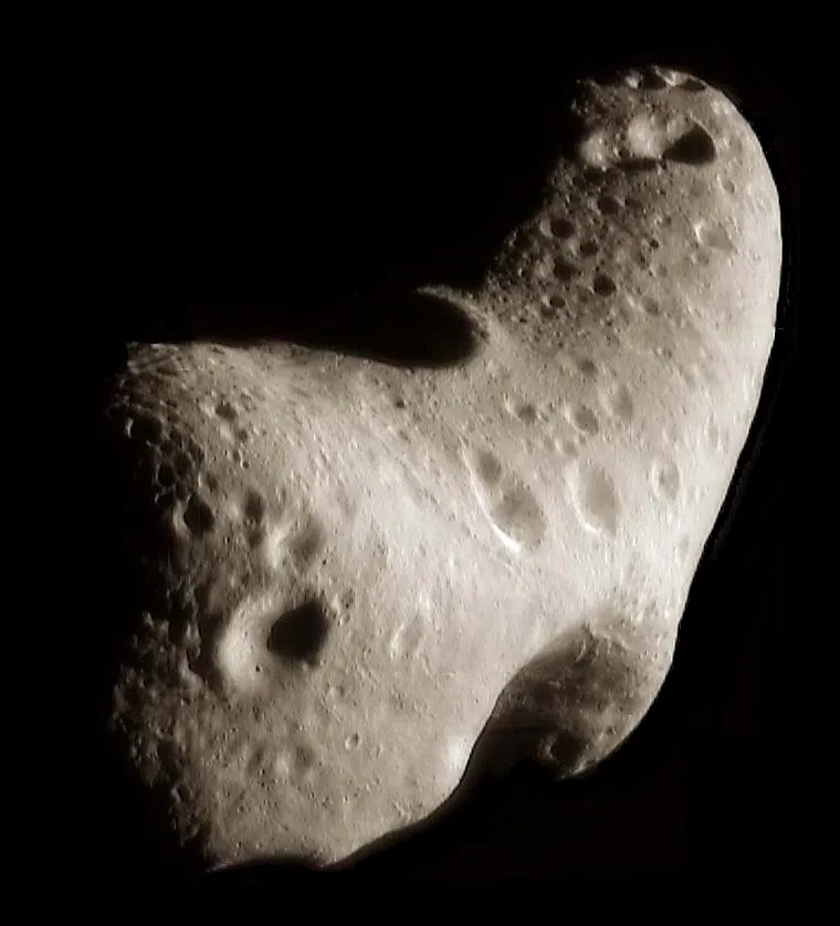 Photograph of an irregular asteroid.